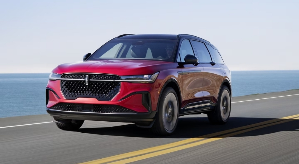 A red 2025 Lincoln Nautilus from the front at an angle.
