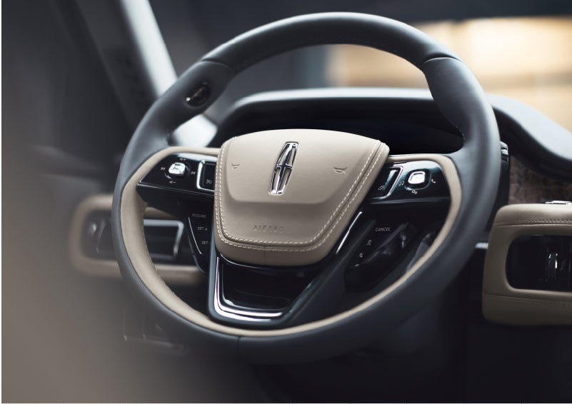 The intuitively placed controls of the steering wheel on a 2023 Lincoln Aviator® SUV | LaFontaine Lincoln Grand Rapids in Grand Rapids MI