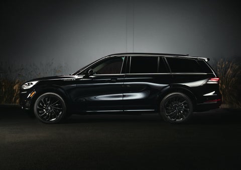 A 2024 Lincoln Aviator® SUV is shown in the Infinite Black exterior color | LaFontaine Lincoln Grand Rapids in Grand Rapids MI