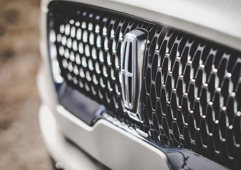 The grille of the 2024 Lincoln Aviator® Reserve model with an eye-catching repeated field of Lincoln Star logo shapes | LaFontaine Lincoln Grand Rapids in Grand Rapids MI