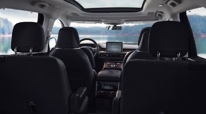 The interior of a 2024 Lincoln Aviator® SUV from behind the second row | LaFontaine Lincoln Grand Rapids in Grand Rapids MI