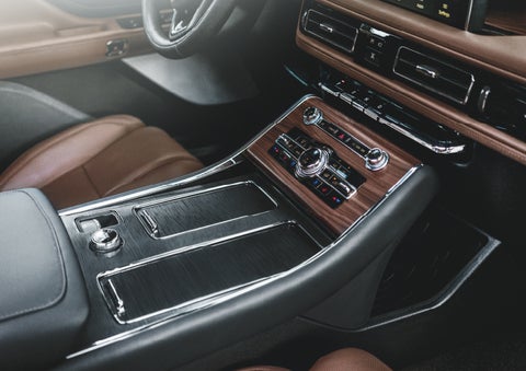 The front center console of a 2024 Lincoln Aviator® SUV is shown | LaFontaine Lincoln Grand Rapids in Grand Rapids MI