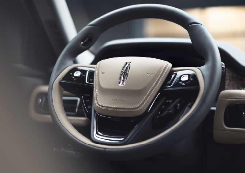 The intuitively placed controls of the steering wheel on a 2024 Lincoln Aviator® SUV | LaFontaine Lincoln Grand Rapids in Grand Rapids MI