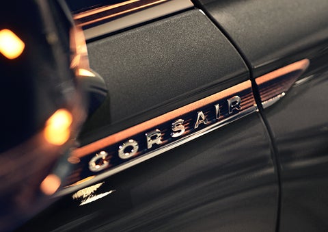 The stylish chrome badge reading “CORSAIR” is shown on the exterior of the vehicle. | LaFontaine Lincoln Grand Rapids in Grand Rapids MI