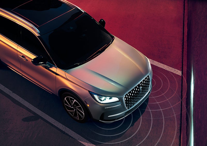 Illustrated radar signals are shown emitting from the front of a 2024 Lincoln Corsair® SUV. | LaFontaine Lincoln Grand Rapids in Grand Rapids MI