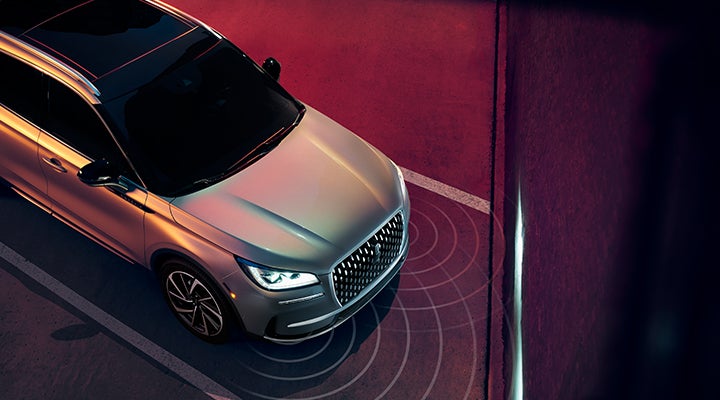 Illustrated radar signals are shown emitting from the front of a 2024 Lincoln Corsair® SUV. | LaFontaine Lincoln Grand Rapids in Grand Rapids MI