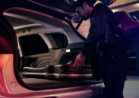The driver of a 2024 Lincoln Corsair® SUV is shown selecting the drive mode. | LaFontaine Lincoln Grand Rapids in Grand Rapids MI