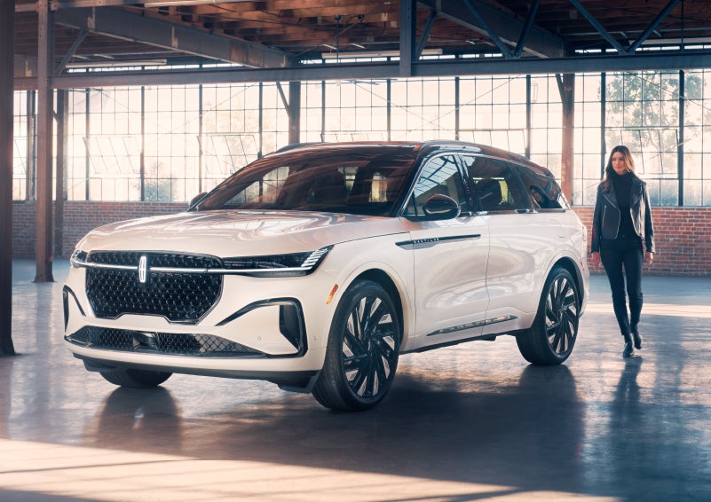 A person approaches a 2024 Lincoln Nautilus® SUV. | LaFontaine Lincoln Grand Rapids in Grand Rapids MI