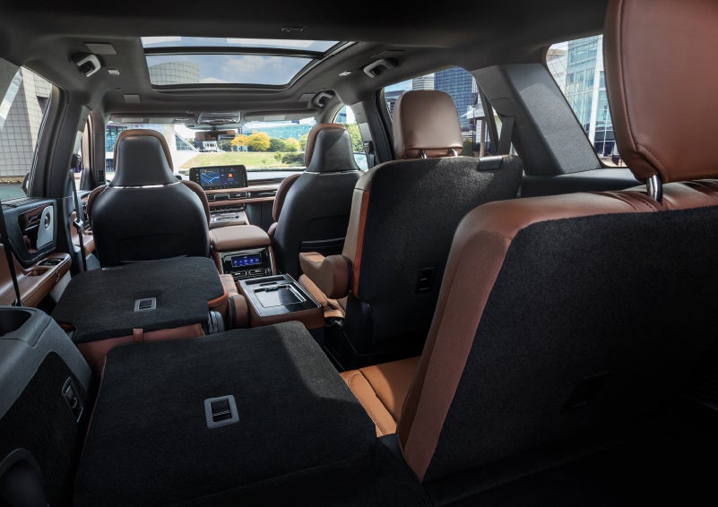 The interior of the 2025 Lincoln Aviator® SUV is shown with two seats folded down for added space. | LaFontaine Lincoln Grand Rapids in Grand Rapids MI