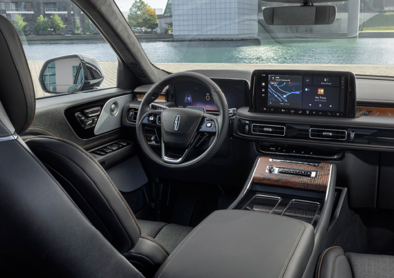 The interior of the 2025 Lincoln Aviator® SUV is shown parked with a view of a harbor through the windshield. | LaFontaine Lincoln Grand Rapids in Grand Rapids MI