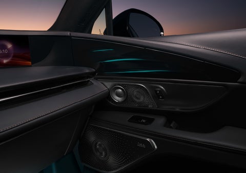 Selectable ambient lighting glows in the passenger door panel. | LaFontaine Lincoln Grand Rapids in Grand Rapids MI