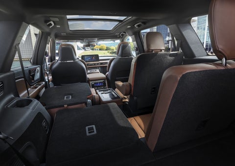 One side of the PowerFold® third-row seat and a second-row seat are folded forward in the 2026 Lincoln Aviator® SUV. | LaFontaine Lincoln Grand Rapids in Grand Rapids MI