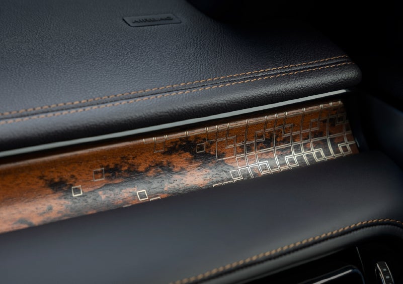 A close-up shot of the 2026 Lincoln Aviator® dashboard with unique black and brown accents and brown stitching. | LaFontaine Lincoln Grand Rapids in Grand Rapids MI