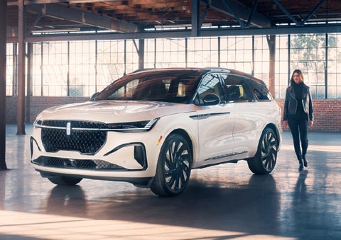 A person approaches a 2026 Lincoln Nautilus® SUV. | LaFontaine Lincoln Grand Rapids in Grand Rapids MI