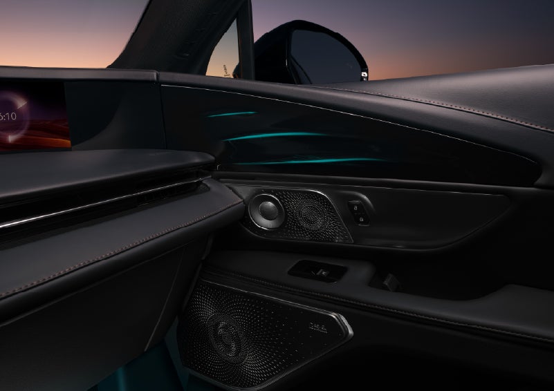 Selectable ambient lighting glows in the passenger door panel. | LaFontaine Lincoln Grand Rapids in Grand Rapids MI