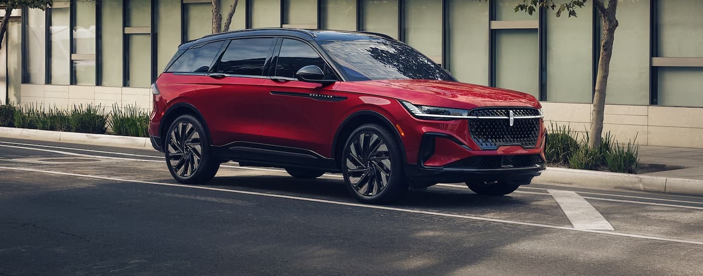 white 2026 Lincoln Nautilus parked by a curb.