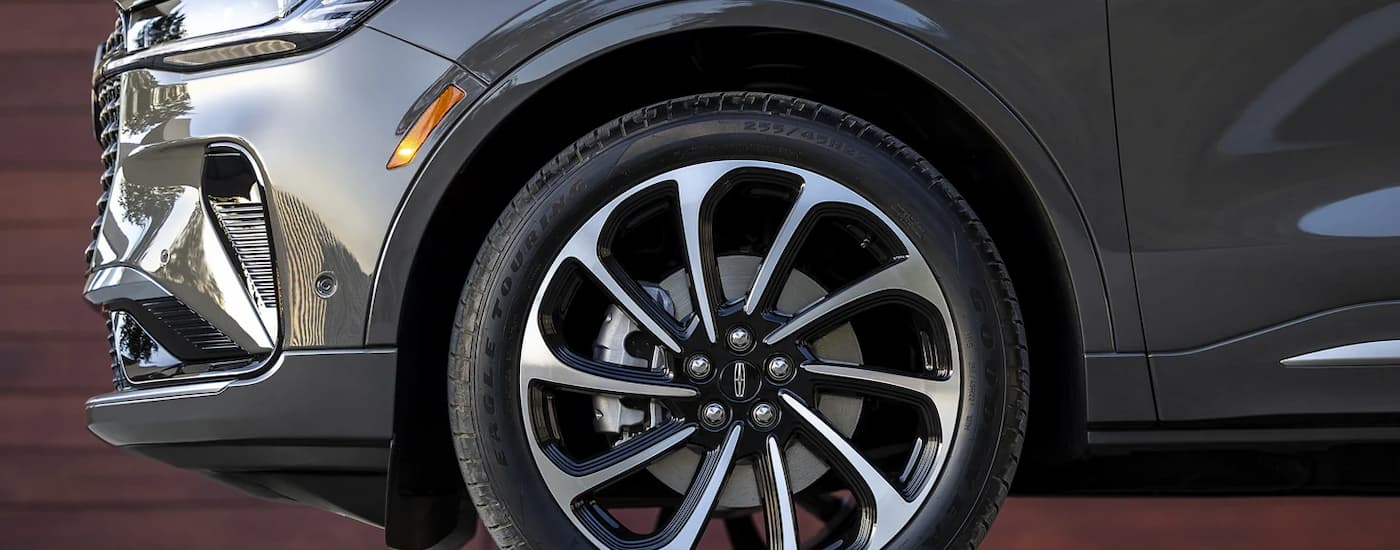Tire and silver rim on a black 2026 Lincoln Nautilus