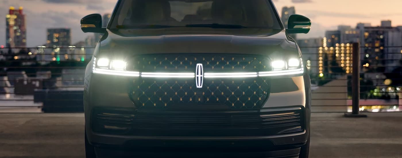 Close-up on the front of a brown 2026 Lincoln Navigator.